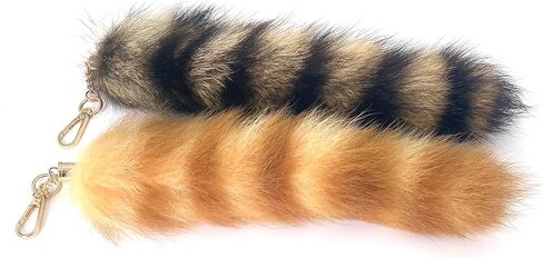 2pcs therian raccoon tail keychain و gold and brown fluffy bag charm و cosplay accessory in Kuwait