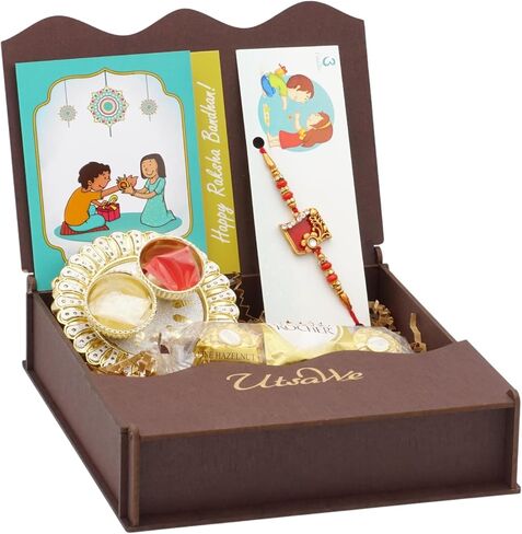 UtsaWe Rakhi Gift Box | Rakhi Gift Hamper made with a Beautiful Mina Rakhi, Roli, Chaval, Mini Thali Set, Greeting Card, and Chocolates | Rakshabandhan Gift | Rakhi Set | Rakhi Hamper | Brother Rakhi (Rakhi_GiftBox_One) in Kuwait
