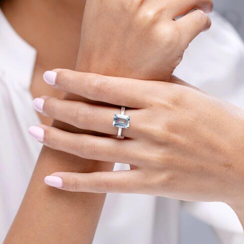 Angara Natural Emerald-Cut Aquamarine Solitaire Engagement Ring with Milgrain in Silver/14K Solid Gold/Platinum | March Birthstone, Birthday, Anniversary, Wedding Jewelry Gift for Women in Saudi Arabia