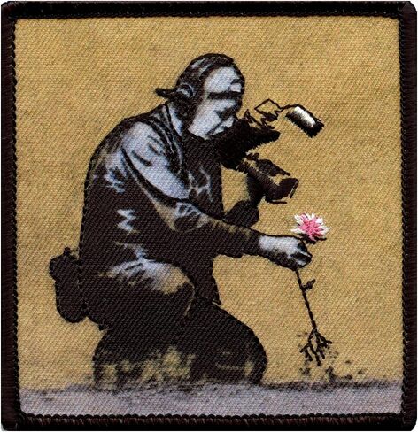 Banksy Flower Puller Photo Patch Street Art Assored On in Saudi Arabia
