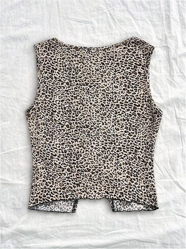 GORGLITTER Girl's Leopard Print Bow Tank Top Cute Crewneck Sleeveless Split Cheetah Tee in Saudi Arabia
