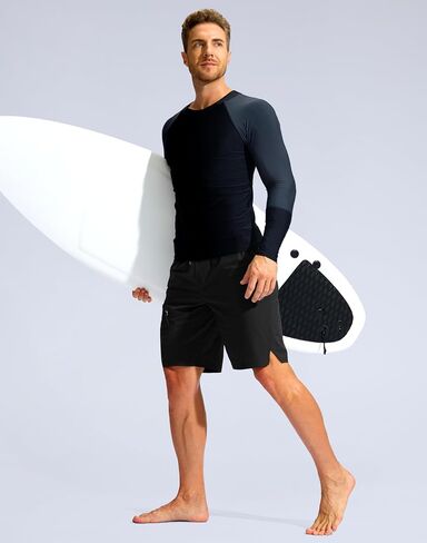 Pudolla Men's Swim Trunks with Compression Liner Quick Dry 9" Board Shorts Bathing Suit with 3 Zipper Pockets in Saudi Arabia