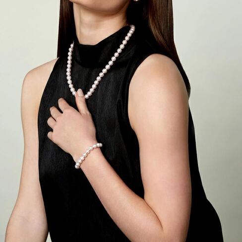 The Pearl Source 14K Gold 5.0-5.5mm AAAA Quality White Freshwater Cultured Pearl Necklace for Women in 24" Matinee Length in Saudi Arabia