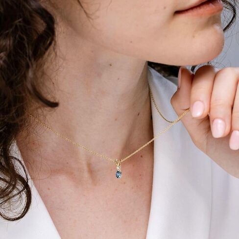 Angara Natural Teal Montana Sapphire Teardrop Pendant with Diamond in Silver / 14K Solid Gold/Platinum | Birthday, Engagement, Anniversary, Wedding Jewelry Gift for Women in Saudi Arabia