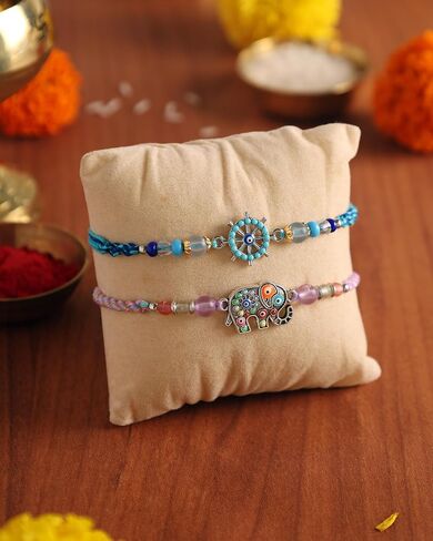 مجموعة من 2 Rakhi for Brother - Premium Evil Eye & Elephant Rakhi Combo with Raksha Bandhan Greeting Card & Roli Chawal | Rakhi لـ Bhaiya & Ksmall Brother | خيط راخي من الأخت in Kuwait