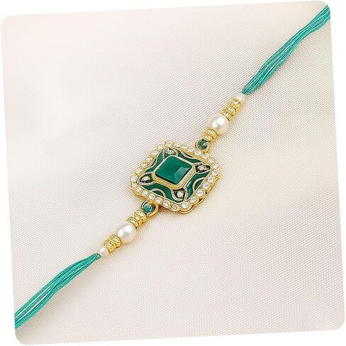 Iwels Rakshabandhan مصمم يدويًا لؤلؤة وكوندان بهايا راخي لأخ/إخوانه/الرجال (R097-100) in Saudi Arabia