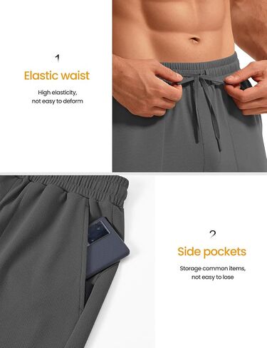 Rdruko Men's Joggers Pants with Zipper Pockets Stretch Tapered Track Pants Athletic Casual Sweatpants for Gym Running in Saudi Arabia