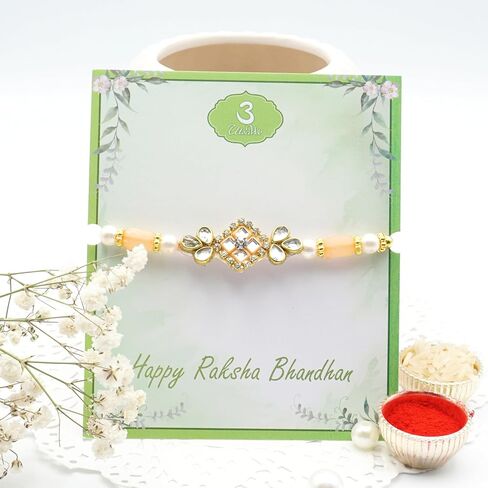 Rakhi Giftbox | Carming Rakhi Giftbox مع Rakhi الجميلة ، Choco ، Pooja Thali ، Roli Chawal وبطاقة تحية مكتوبة قبل | مجموعة الهدايا راخي in Kuwait