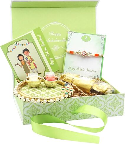 Rakhi Giftbox | Carming Rakhi Giftbox مع Rakhi الجميلة ، Choco ، Pooja Thali ، Roli Chawal وبطاقة تحية مكتوبة قبل | مجموعة الهدايا راخي in Kuwait