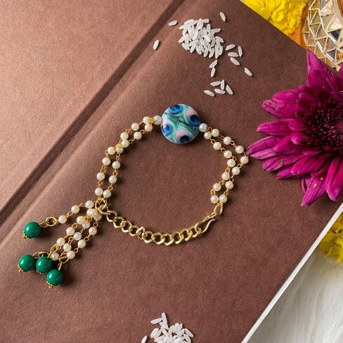 I Jewels Rakshabhandhan Special Peacock Feather Beaded Bhaiya Bhabhi Chain Lumba Rakhi Combo Set (R103-112CO) in Saudi Arabia