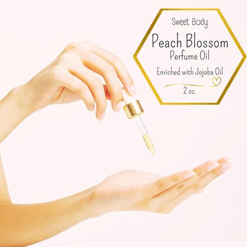 زيت الجسم العطري PEACH BLOSSOM الغني بزيت الجوجوبا | رائحة تدوم طويلاً، مزيج من الزيوت العطرية من الفواكه والزهور اللذيذة | زجاجة قطارة زجاجية 2 أوقية. in Kuwait