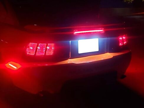 iJDMTOY عدسة سوداء مدخنة LED ضوء الفرامل الثالث متوافق مع 1999-2004 Ford Mustang، مدعوم بـ 12 بواعث LED حمراء فائقة السطوع in Kuwait