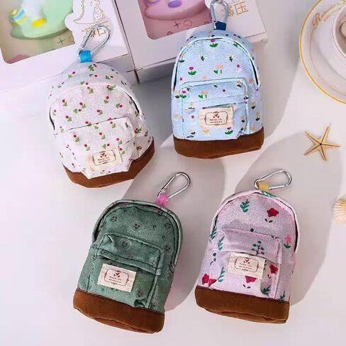 1pc حقيبة مفاتيح على شكل حقيبة ظهر صغيرة زرقاء ، محافظ تصميم الأزهار ، أكياس سحاب ، محفظة عملة ، أحمر شفاه الجيب ، منظم كابل بيانات حامل البطاقة in Saudi Arabia