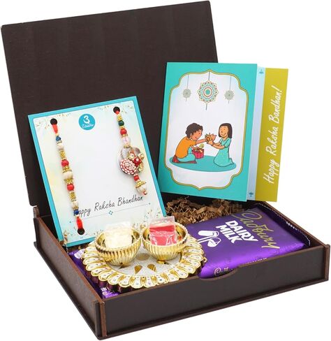 Rakhi Gift Box with Bhaiya Bhabhi Rakhi Set made of Floral Motif, Beads, includes Roli, Chawal, Raksha Bandhan Card, Thali Set, and Chocolate (Elegant Couple Rakhi) in Kuwait