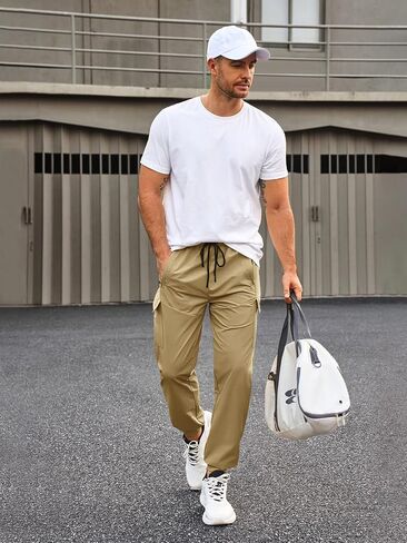 Yousify Mens Sweatpants Athletic Jogger Pants Drawstring Elastic Waist Workout Sports Track Pants with Zipper Pockets in Kuwait