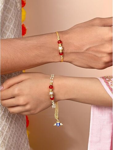 Aheli Maroon & Gold Color Rakhi & Lumba لـ Bhaiya & Bhabhi Pearl مرصع Raksha Bandhan Rakhi مع بطاقة تحية (Combo ، Pack of 2) in Saudi Arabia