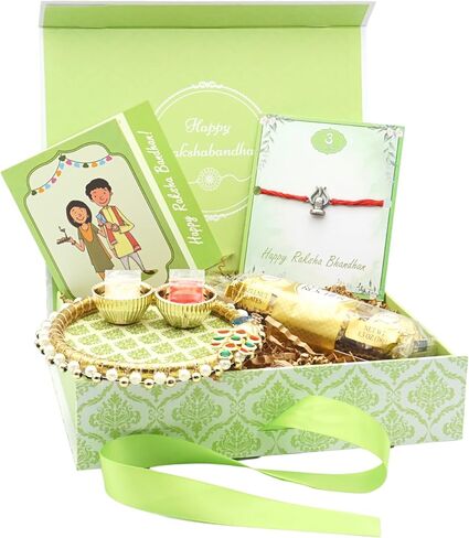Rakhi Giftbox | Raksha Bandhan Giftbox مع Rakhi الفاخرة ، Choco ، Pooja Thali ، Roli Chawal وبطاقة تحية مسبقة | مجموعة الهدايا راخي in Kuwait