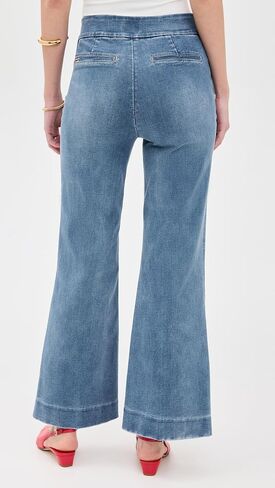 Alice + Olivia Quinn's High Rise Bootcut Jeans in Saudi Arabia