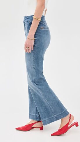 Alice + Olivia Quinn's High Rise Bootcut Jeans in Saudi Arabia