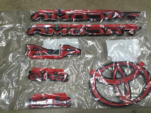 Genuine Toyota 2024 + Tacoma SR5 Matte Black Emblem Proplay Set PT948-35244-02 in Saudi Arabia