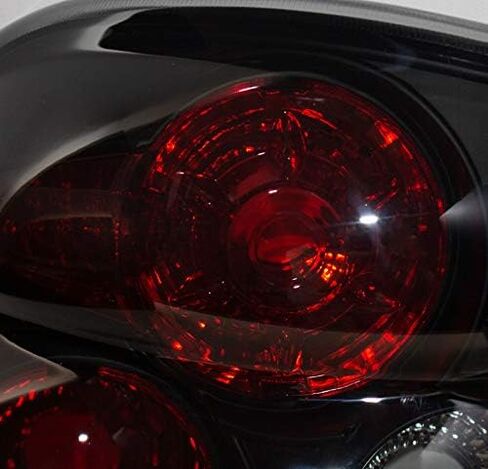 تشيفي سيلفرادو/GMC Sierra Stepside Altezza Tail Light Black/Smoke مجموعة جديدة in Kuwait