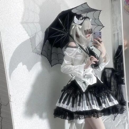 نساء مطوية y2k تنورة لطيفة مرنة الخصر الأسود والأبيض مفتاح البيانو العصري بولكا نقطة الدانتيل تنورة لوتس in Kuwait