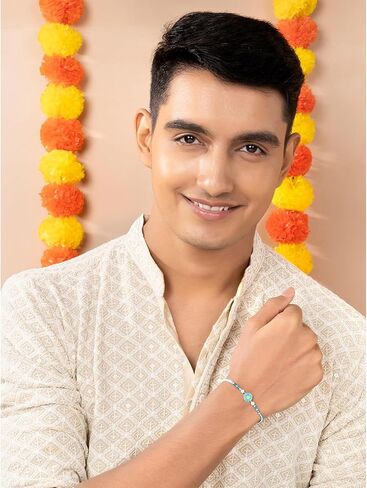 Aheli Floral Design Sterling Silver Rakhi in Light Blue & White Color Thread for Brother Raksha Bandhan Rakhi مع بطاقة تحية in Saudi Arabia
