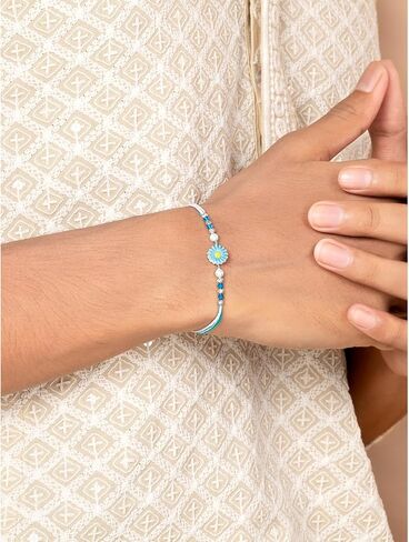 Aheli Floral Design Sterling Silver Rakhi in Light Blue & White Color Thread for Brother Raksha Bandhan Rakhi مع بطاقة تحية in Saudi Arabia