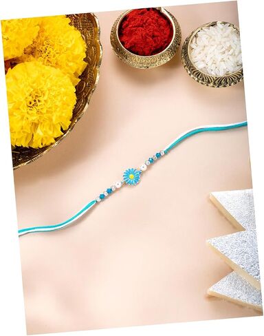 Aheli Floral Design Sterling Silver Rakhi in Light Blue & White Color Thread for Brother Raksha Bandhan Rakhi مع بطاقة تحية in Saudi Arabia