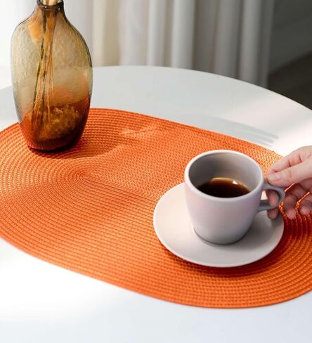 مجموعة مفارش بيضاوية مضفرة من FunWheat مكونة من 6 مفارش طاولة لطاولات الطعام منسوجة وقابلة للغسل وغير قابلة للانزلاق ومفارش طاولة مقاس 12 × 18 بوصة للاستخدام الداخلي والخارجي (برتقالي بيضاوي، 6 قطع) in Kuwait