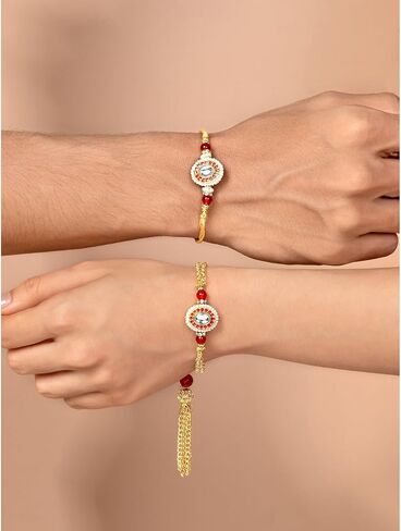 Aheli Red & Gold Color Rakhi & Lumba for Bhaiya & Bhabhi Crystals & Beads Studded Raksha Bandhan Rakhi with Greeting Card (Combo, Pack of 2) in Saudi Arabia