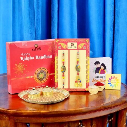 SATVIK Couple Rakhi: Bhaiya Bhabhi Rakhi Set with Kumkum Holder Thali, Roli Chawal, Greeting Card, and Soun Stickers - Celebrate Raksha Bandhan with Elegance and Tradition in Saudi Arabia
