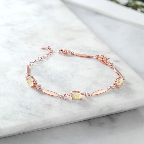Gem Stone King 18K Rose Gold Plated Silver Red Created Ruby and White Moissanite Tennis Bracelet For Women | 3.70 Cttw | Gemstone July Birthstone | Oval 7X5MM | 6 Inch + 1 Inch Extender in Saudi Arabia