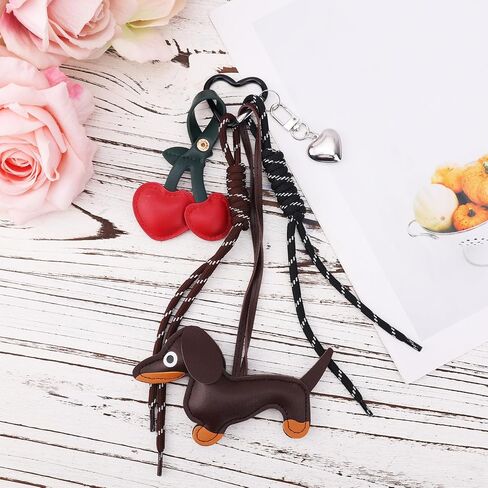 Boxob Leather Dachshund keychain ، لطيف قلب الكلب الكرز Keyring Puppy Bag Bag Pendant سلسلة مفاتيح سحر dachshund لحقيبة اليد محافظ السيارات الهدايا الموضة لعشاق الكلاب in Saudi Arabia