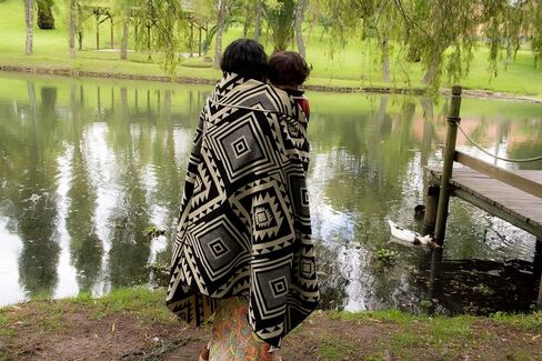 Alpaca Wool Blanket 80x45 inch: Soft, Warm, Hypoallergenic, Unique Designs– Ideal for Camping and Air Travel, Red Tones in Saudi Arabia