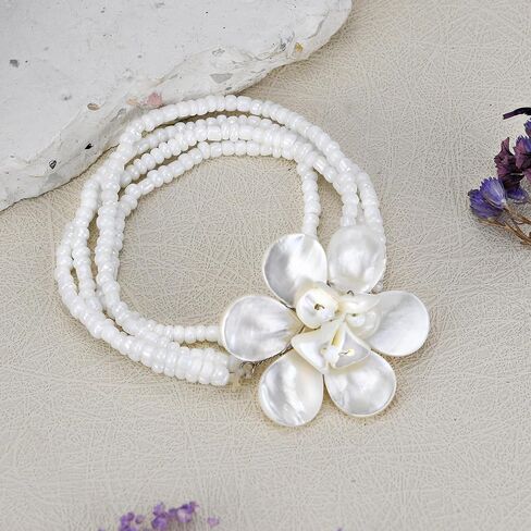 AeraVida Elegant White Ocean Flower Mother of Pearl and Bead Floral Bracelet in Saudi Arabia