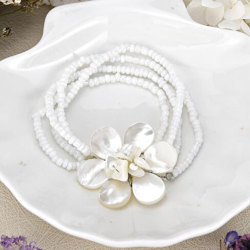 AeraVida Elegant White Ocean Flower Mother of Pearl and Bead Floral Bracelet in Saudi Arabia