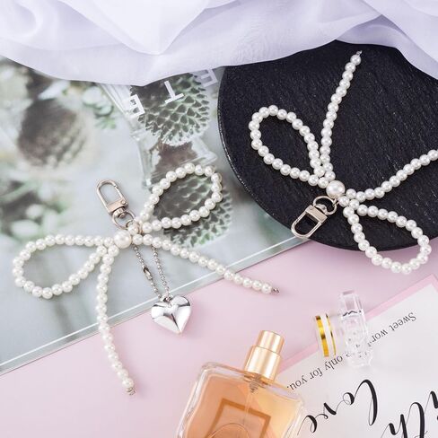 Joez Wonderfic Pearl Bow Tassel Keychain ، سلسلة مفاتيح جمالية لطيفة ، y2k pearl bowknot keyring ، ملحقات زخرفية in Saudi Arabia