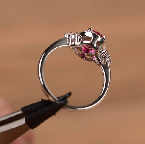 Yaya Elegant 925 Silver Plated Oval Cut Simulated Ruby Halo Engagement Ring Birth Stone Halo Solitaire Ring for Women in Kuwait