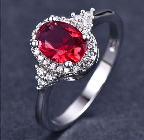 Yaya Elegant 925 Silver Plated Oval Cut Simulated Ruby Halo Engagement Ring Birth Stone Halo Solitaire Ring for Women in Kuwait