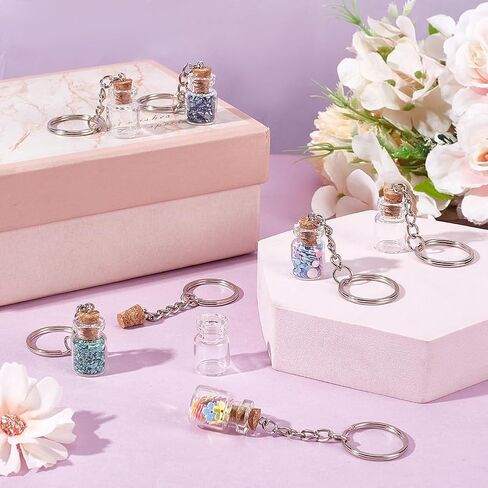 UNICRAFTALE 15Pcs Mini Glass Bottles 3ml Glass Vials with Corks Lids Clear Spell Jars with Metal Keychain Tiny Jars with Lids Message Potion Bottles for DIY Wedding Favors Party Home Decoration in Saudi Arabia