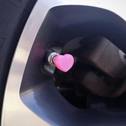 Pink Heart Shaped Tire Valve Stem Caps (Love Potion) in Saudi Arabia