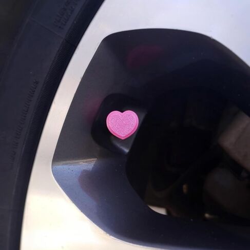 Pink Heart Shaped Tire Valve Stem Caps (Love Potion) in Saudi Arabia