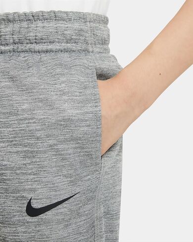 بنطال تدريب Nike Therma Big Kids (للأولاد) (رمادي دخاني/HTR/أسود، CU9082-084) in Saudi Arabia