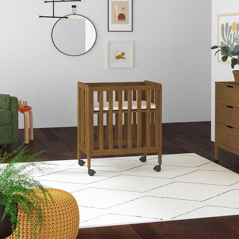 Carter's by daVinci Colby Grow 6-in-1 Convertible Bassinet to Crib in Walnut, GREENGUARD Gold Certified, Removable Wheels in Kuwait