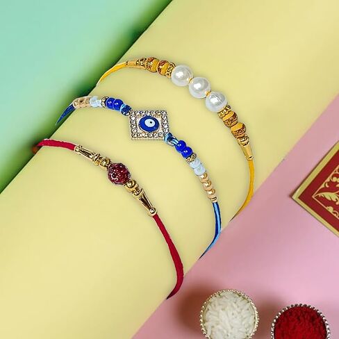 مجموعة من 3 مصمم Rakhi Threads - Evil Eye ، Rudraksha ، و Pearl Beaded Rakhi - Raksha Bandhan التقليدية المقدمة للاحتفال بالمهرجان in Saudi Arabia