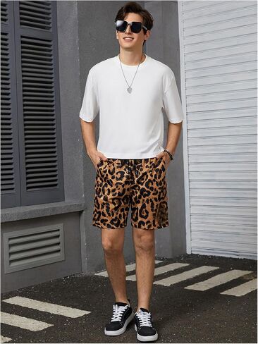 OYOANGLE Men's Leopard Graphic Print Adjustable Elastic Waist Drawstring Workout Shorts in Kuwait