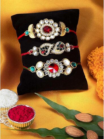 إرث Aheli التقليدي لـ Rakshabandhan مع Stones & Kundan Rakhi للأخ ، Green & Red ، مجموعة من 3 in Saudi Arabia