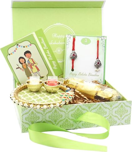 Rakhi Giftbox | Premium Bhaiya Bhabhi Rakhi Giftbox مع مجموعة Rakhi Red Silver ، Choco ، Pooja Thali ، Roli Chawal وبطاقة تحية مسبقة | مجموعة الهدايا راخي in Kuwait