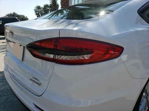 Slickmod Chrome Delete Blackout Vinyl Overlay for 2019-2020 Ford Fusion Rent Trunk Trunk (Gloss Black) in Saudi Arabia